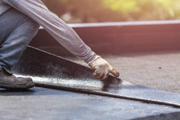 Professional Basement Waterproofing technician working in Hamden, OH